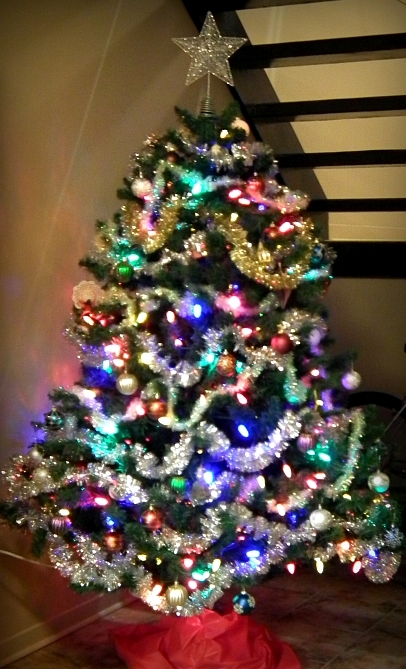 The tree in our apartment complex lobby, decorated by many hands...